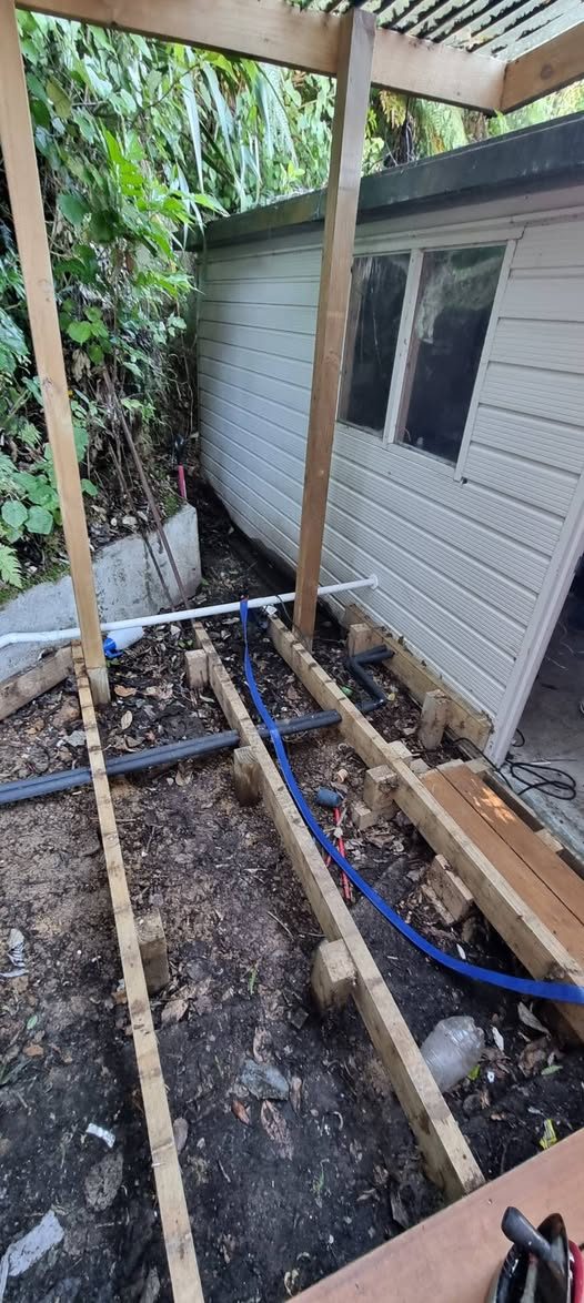 New-build drainage pipework laid into joist framing